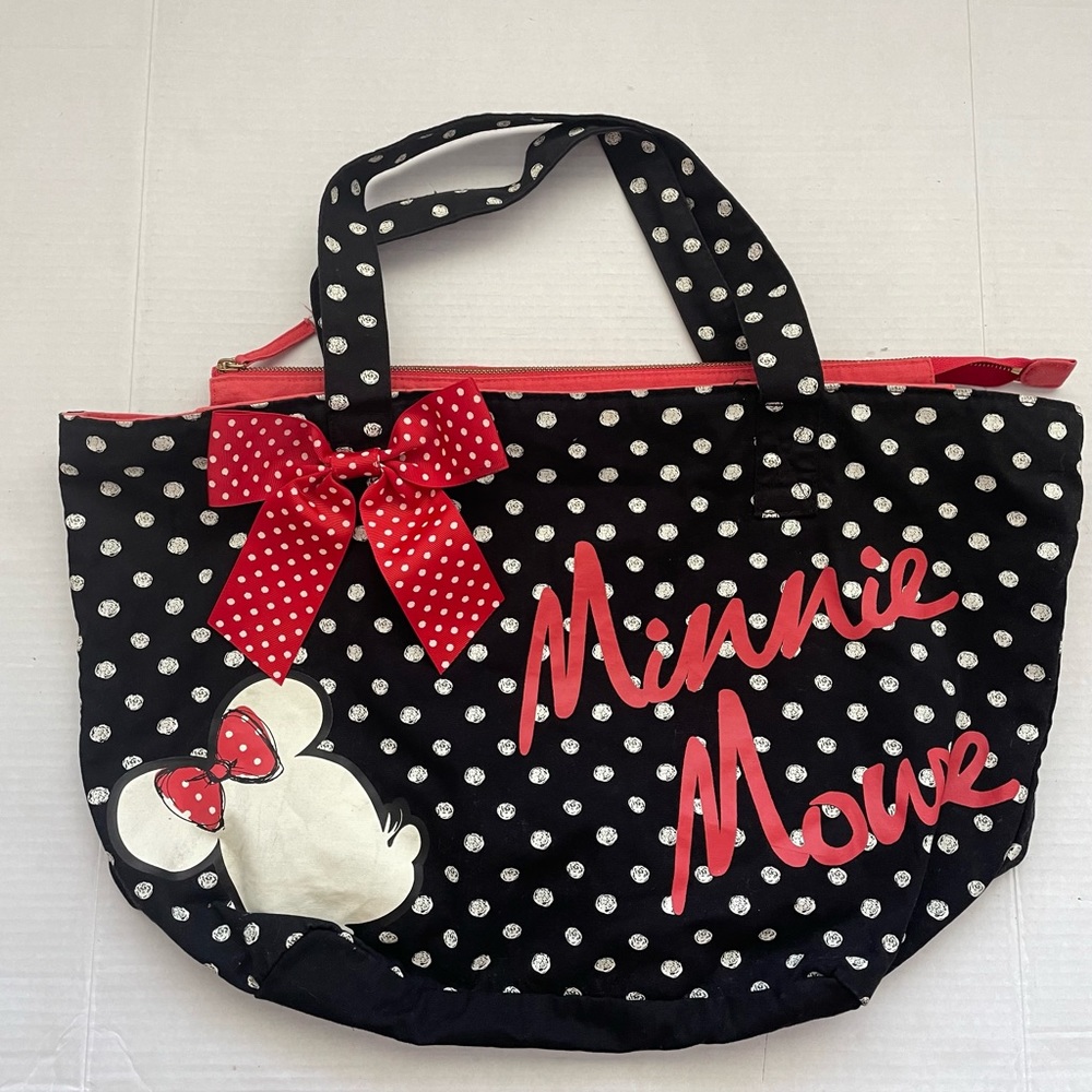 Disney Parks Black canvasback tote with polka dots in good used condition.